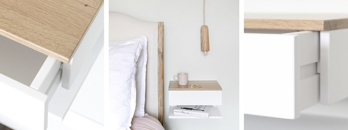 white floating bedside table with oak top and oak pendant light