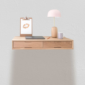 floating oak desk with pink oak lamp
