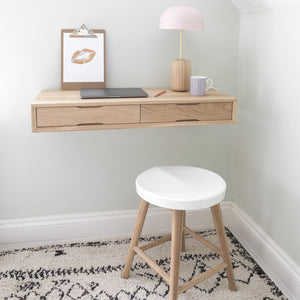 floating oak desk with white stool